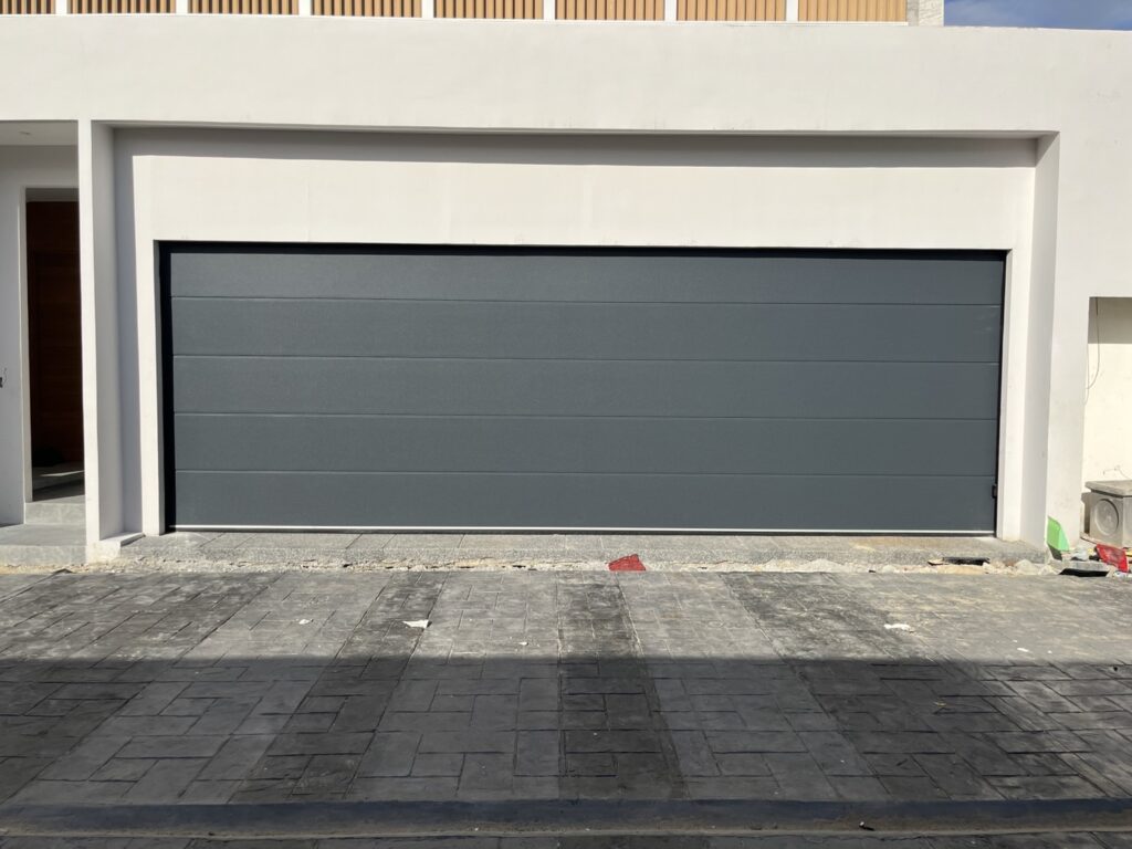 Installation photo of Garage Doors for Housing Estate / Developer in Nonthaburi by OZ DOOR