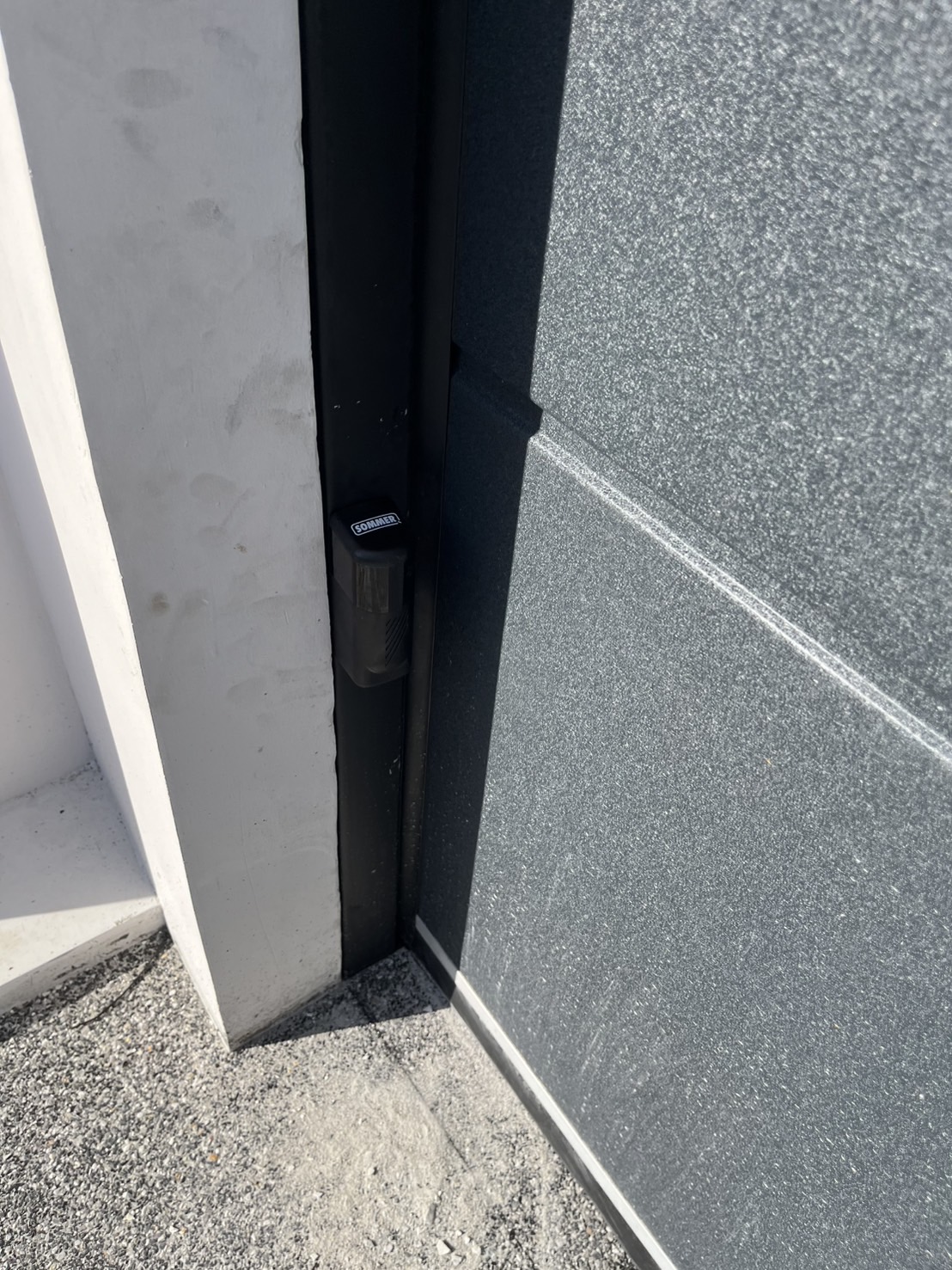 Installation photo of Garage Doors for Housing Estate / Developer in Nonthaburi by OZ DOOR (2)