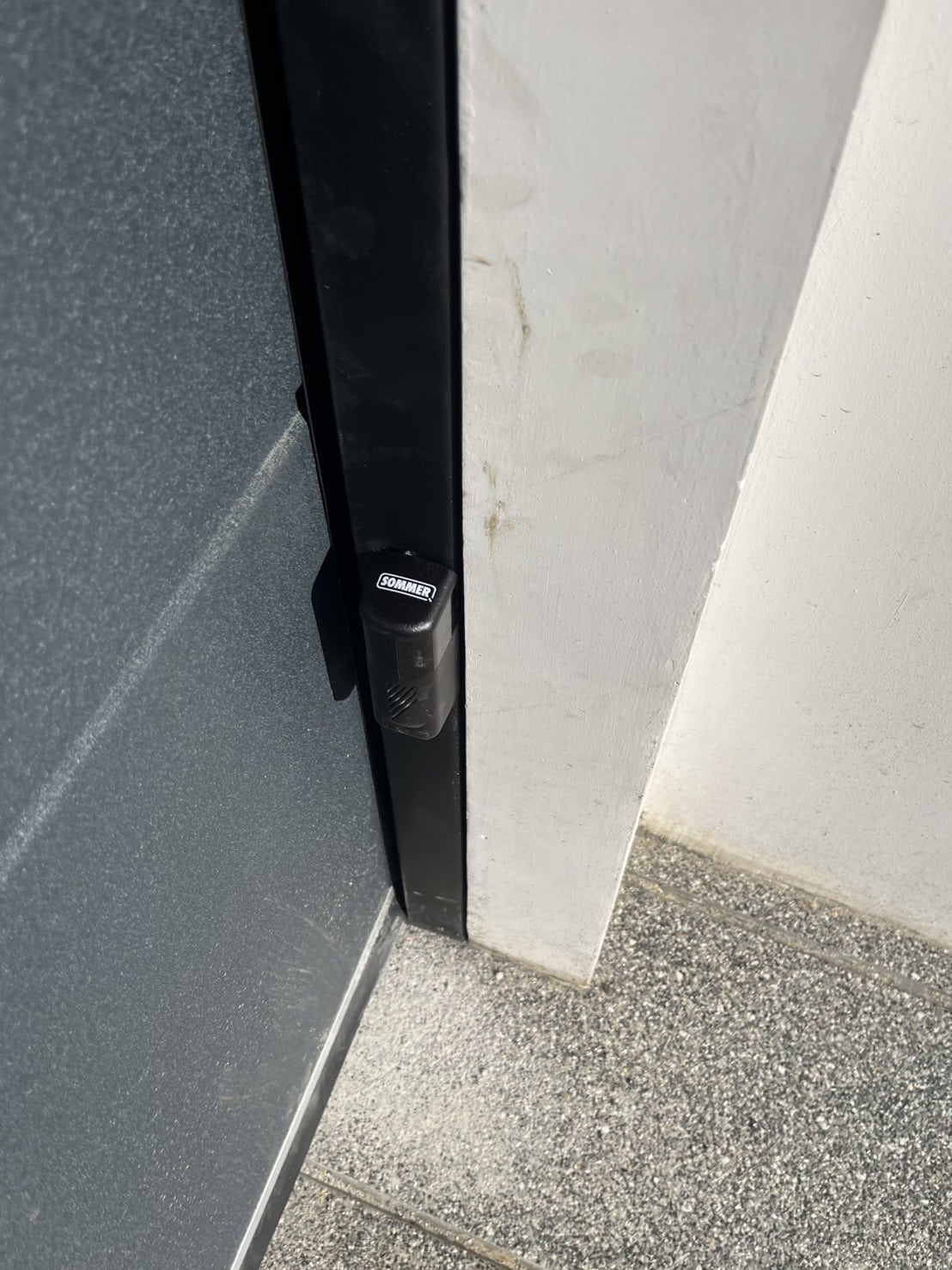 Installation photo of Garage Doors for Housing Estate / Developer in Nonthaburi by OZ DOOR (3)