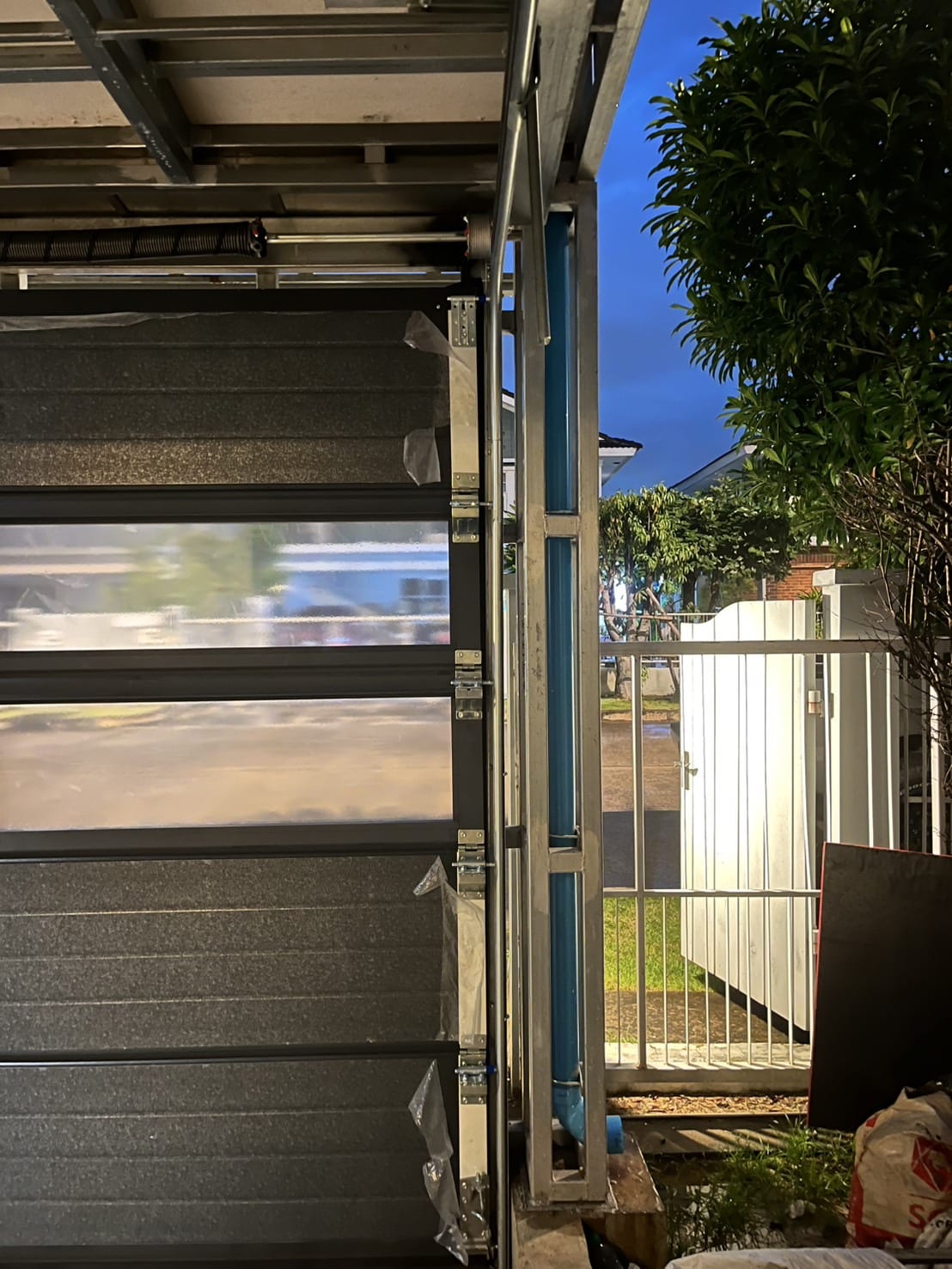 Installation photo of Garage Doors for Single House in Bangkok by OZ DOOR (6)