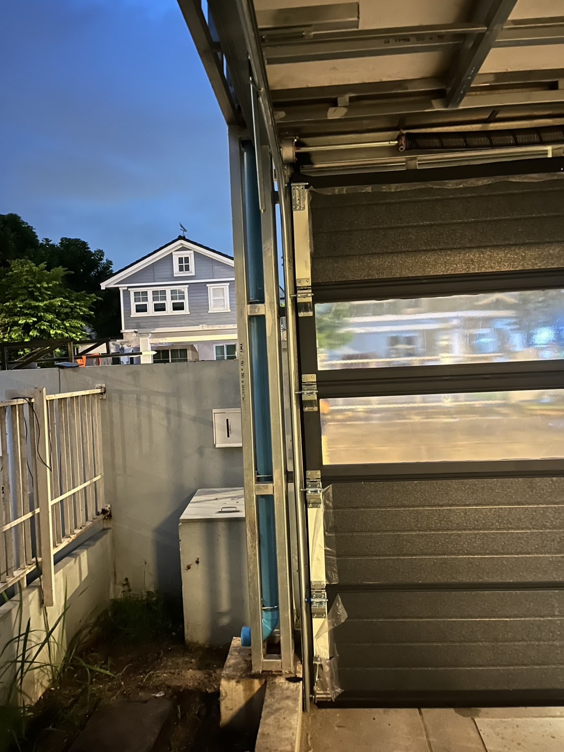 Installation photo of Garage Doors for Single House in Bangkok by OZ DOOR (7)