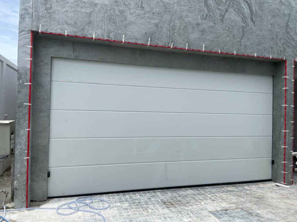 Installation photo of Garage Doors for Single House in Bangkok by OZ DOOR