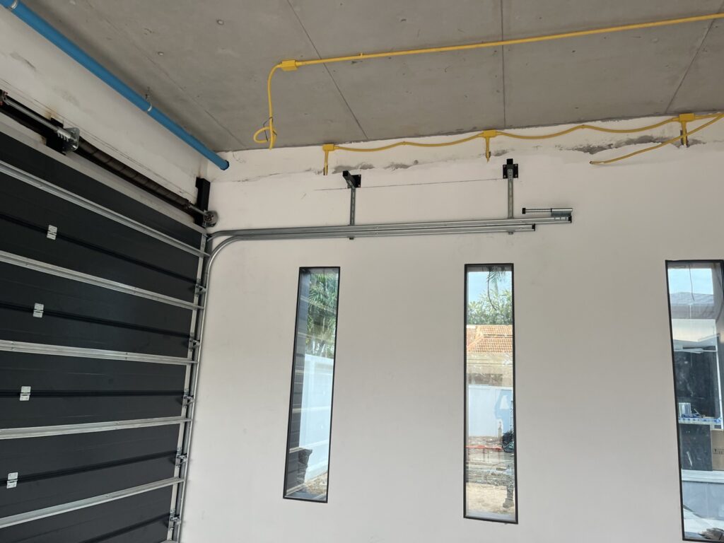 Installation photo of Garage Doors for Single House in Phuket by OZ DOOR (2)