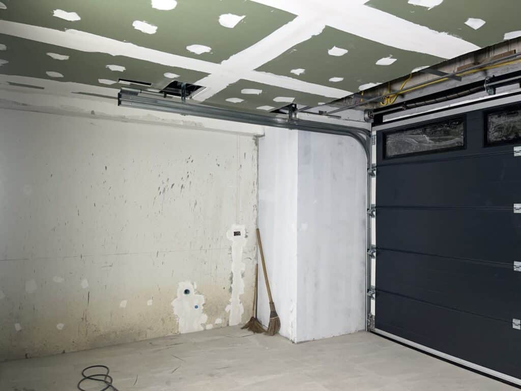 Installation photo of Garage Doors for Single House in Samut Prakan by OZ DOOR (2)