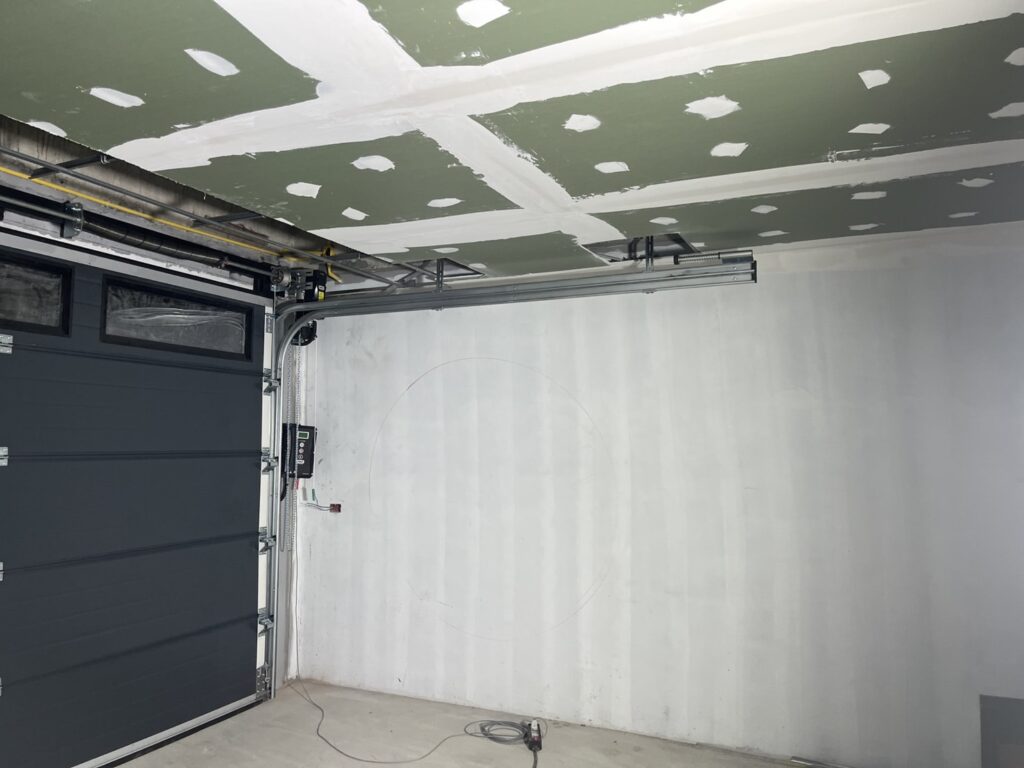 Installation photo of Garage Doors for Single House in Samut Prakan by OZ DOOR (3)