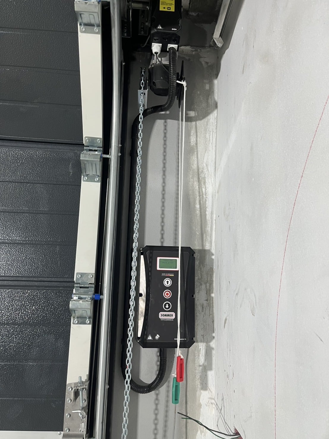 Installation photo of Garage Doors for Single House in Samut Prakan by OZ DOOR (5)