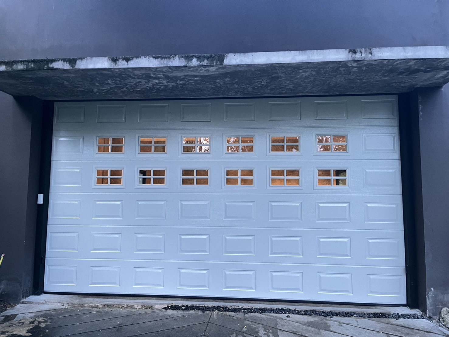 Installation photo of Garage Doors for Residential Projects in Bangkok by OZ DOOR