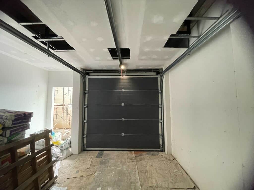 Installation photo of Garage Doors for Residential Projects in Bangkok by OZ DOOR