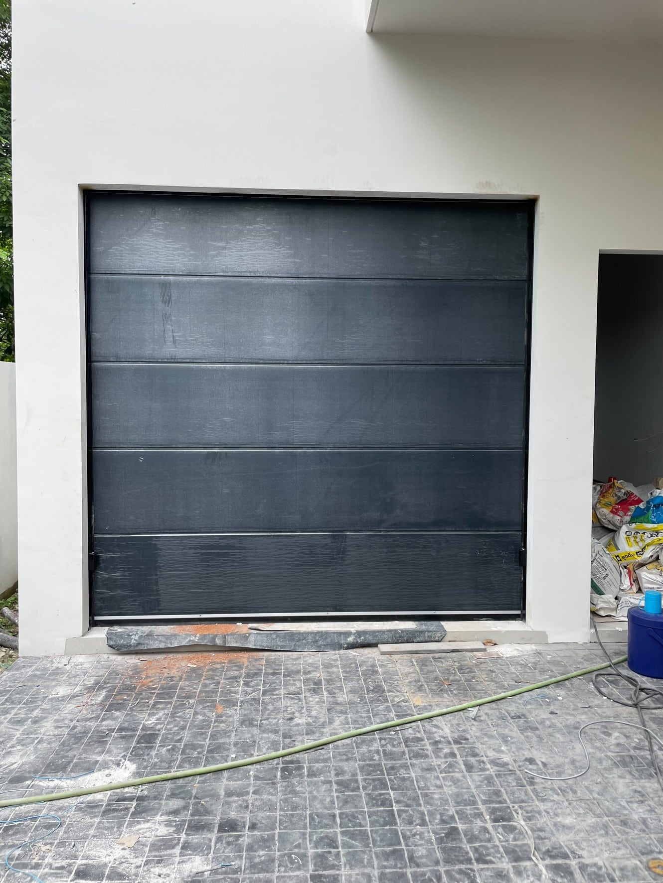 Installation photo of Garage Doors for Residential Projects in Bangkok by OZ DOOR