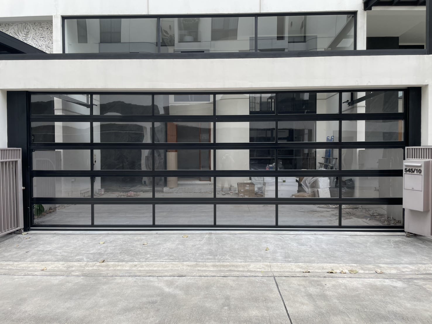 Installation photo of Garage Doors for Single House in Bangkok by OZ DOOR