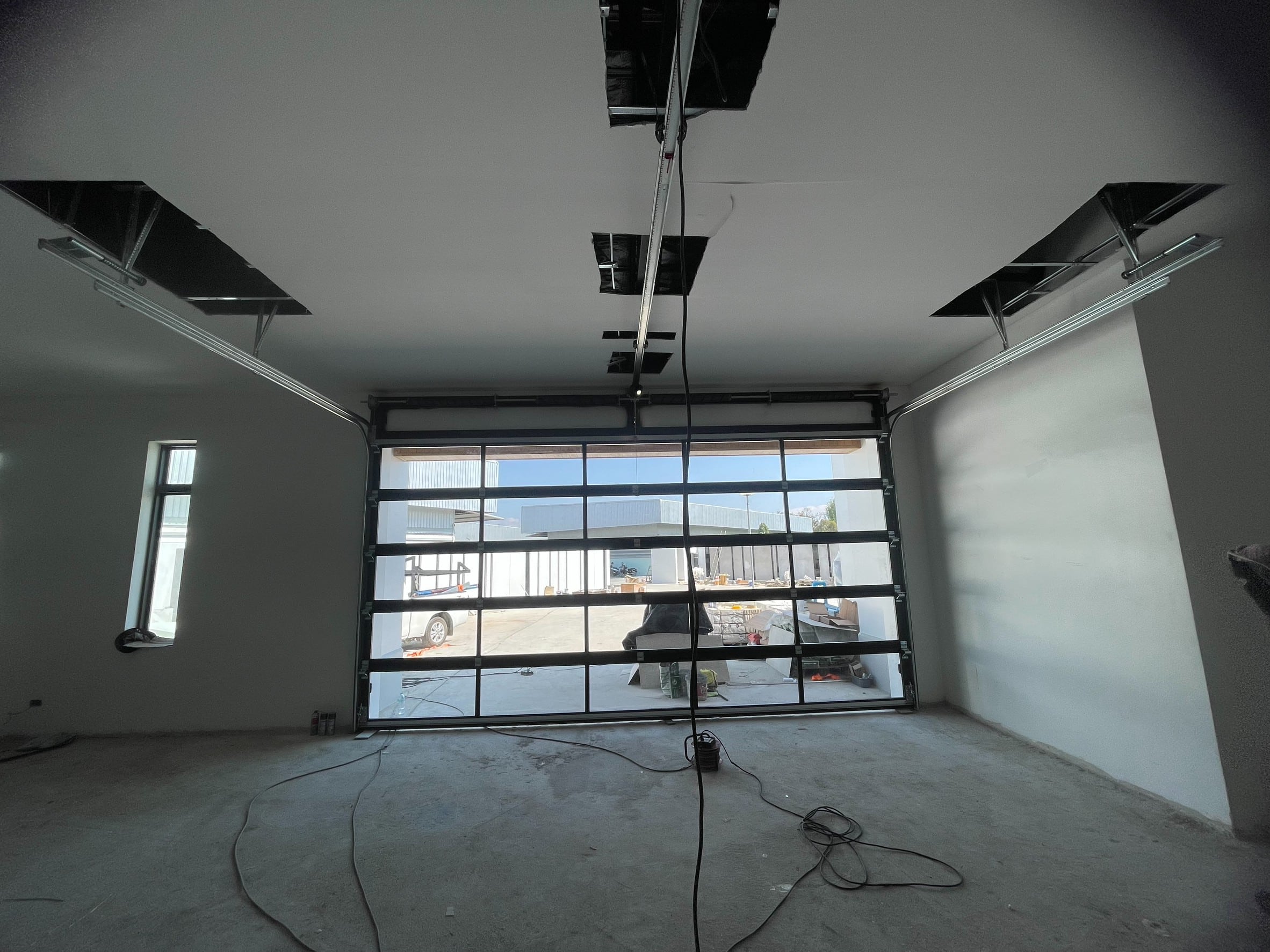 Installation photo of Garage Doors for Single House in Chiang Mai by OZ DOOR