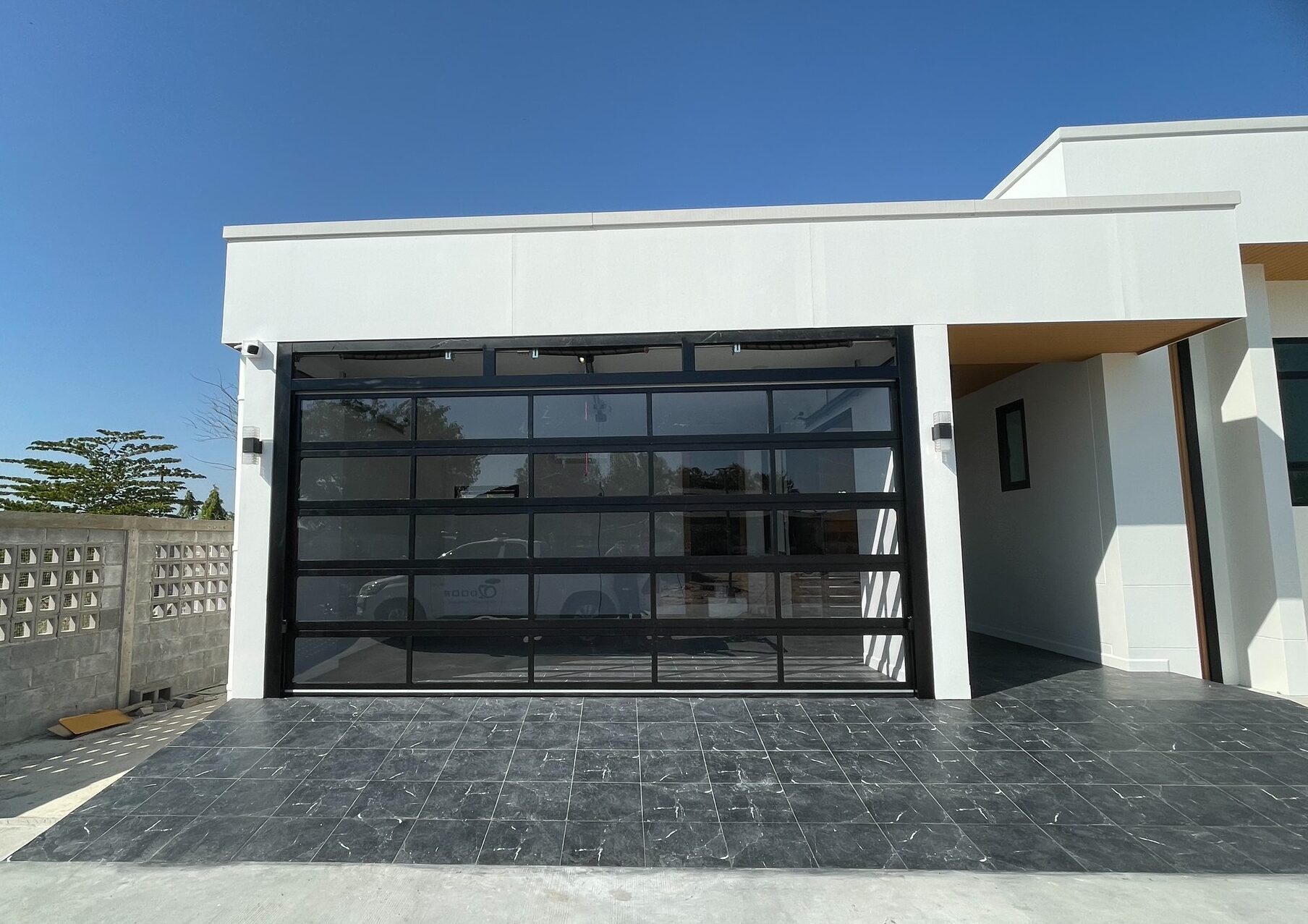 Installation photo of Garage Doors for Single House in Chonburi by OZ DOOR