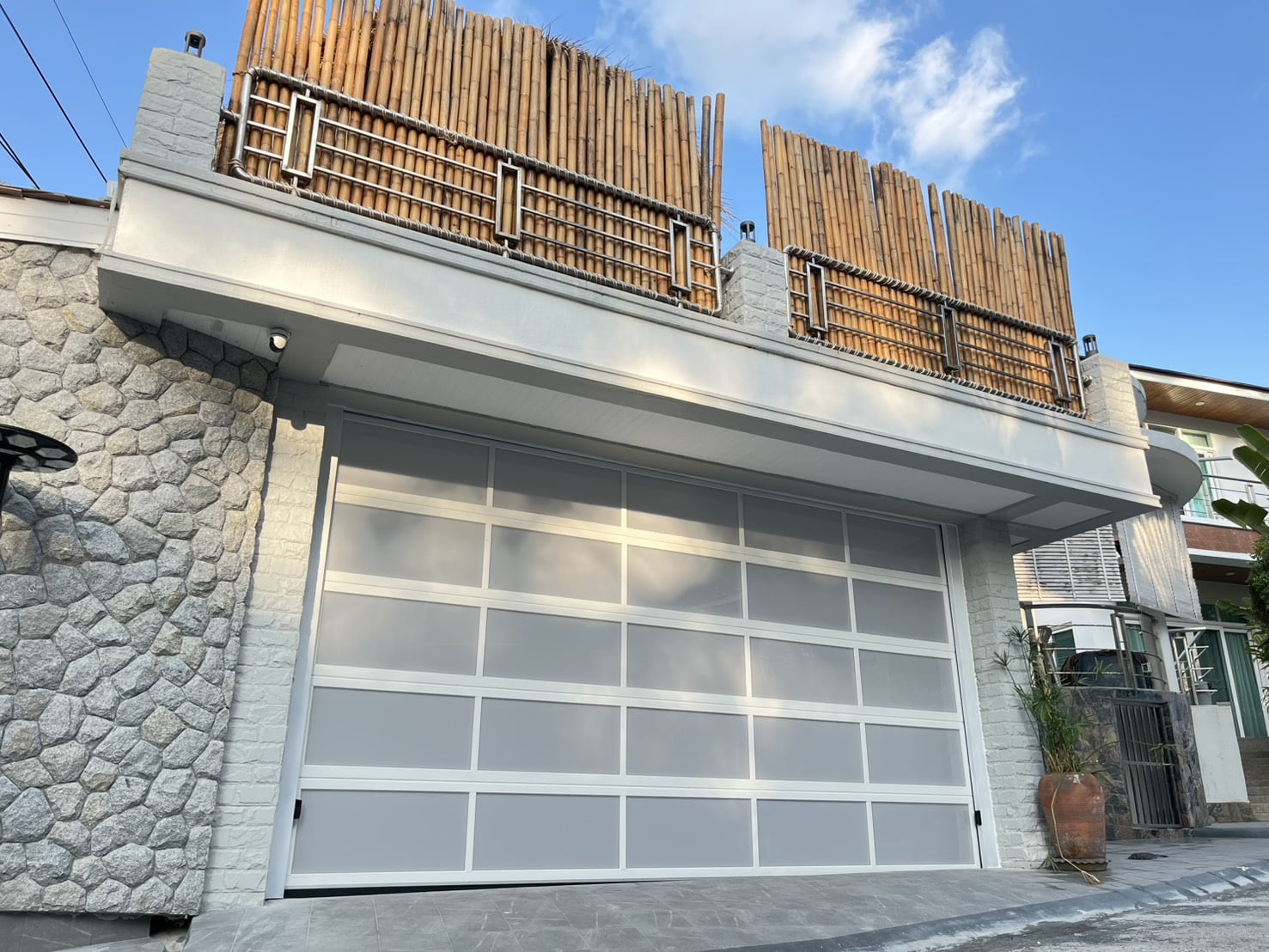 Installation photo of Garage Doors for Single House in Phuket by OZ DOOR