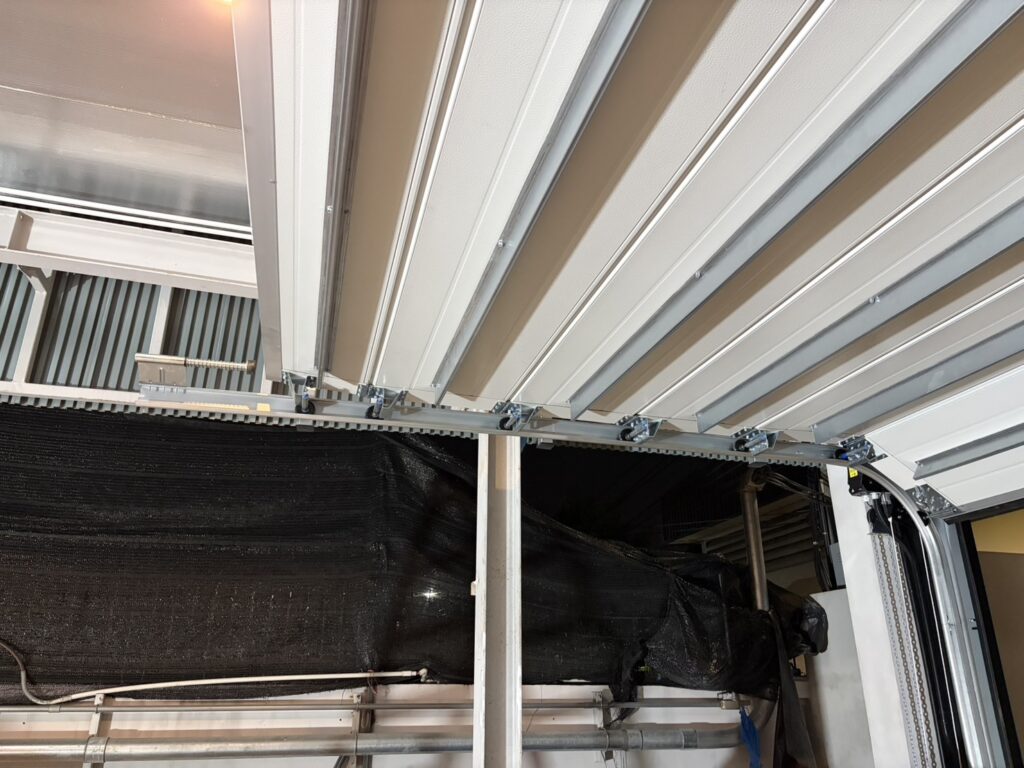 Installation photo of Garage Doors for Housing Estate / Developer in Pathum Thani by OZ DOOR (9)