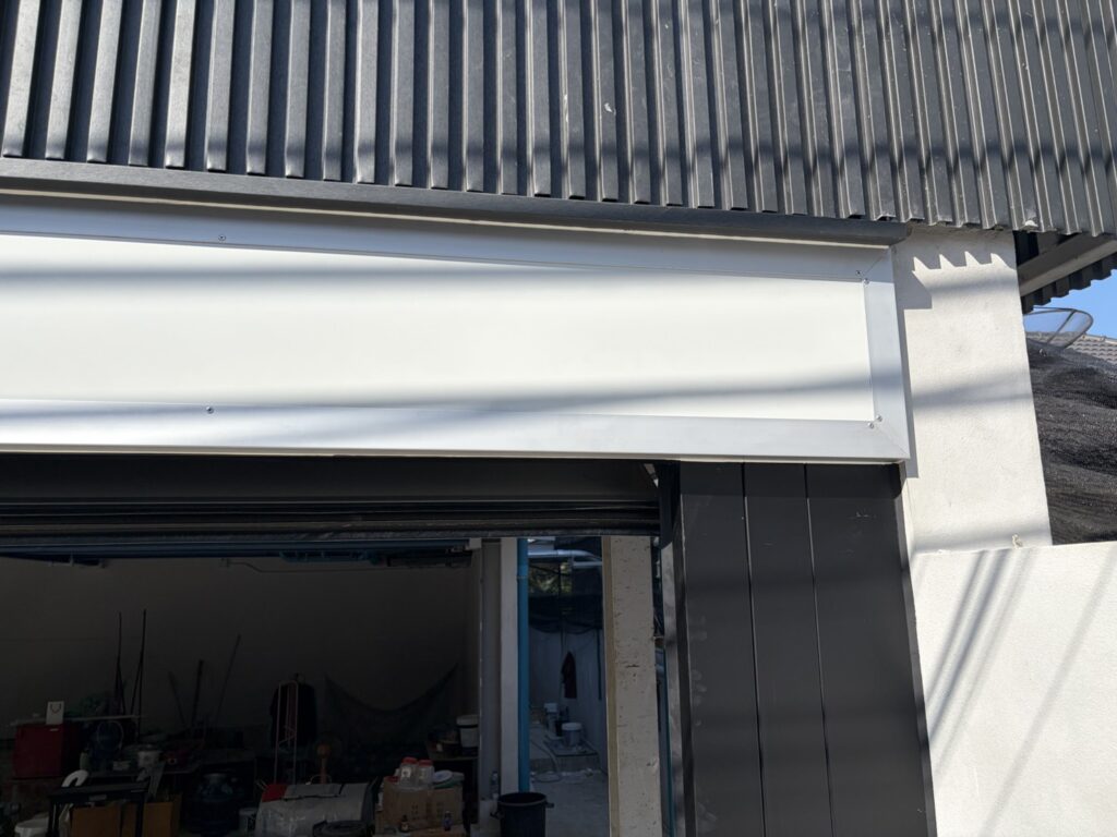 Installation photo of Garage Doors for Housing Estate / Developer in Pathum Thani by OZ DOOR (24)