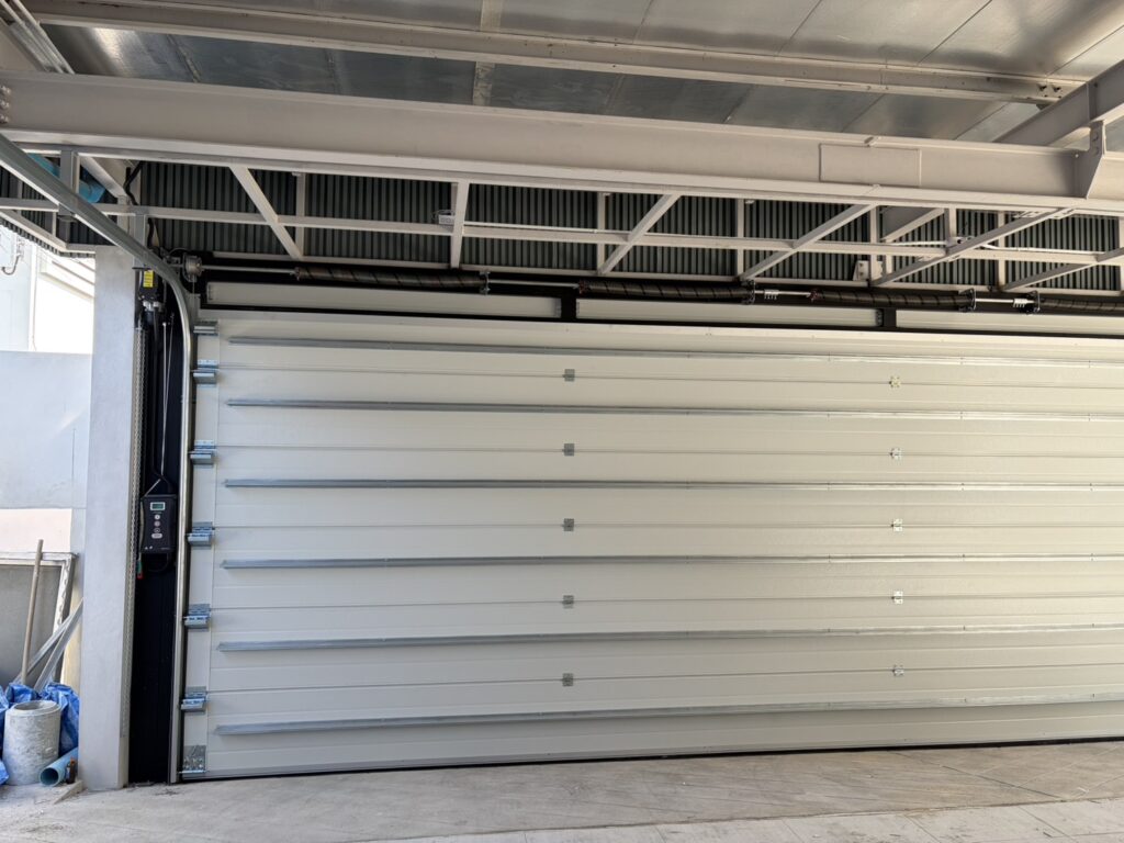 Installation photo of Garage Doors for Housing Estate / Developer in Pathum Thani by OZ DOOR (25)