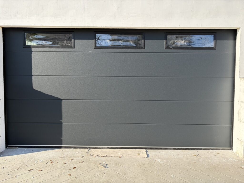 Installation photo of Garage Doors for Single House in Nonthaburi by OZ DOOR (2)