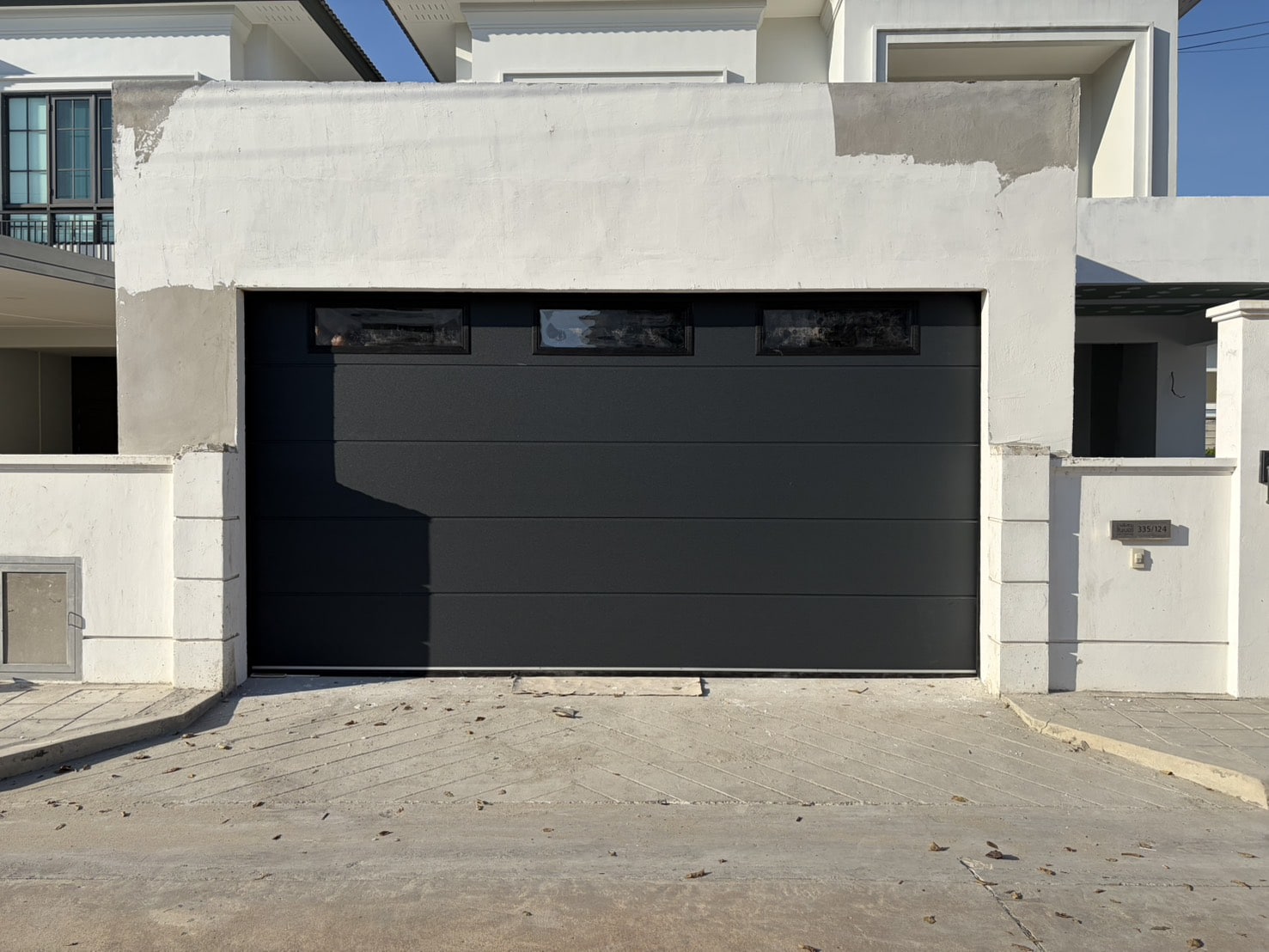 Installation photo of Garage Doors for Single House in Nonthaburi by OZ DOOR