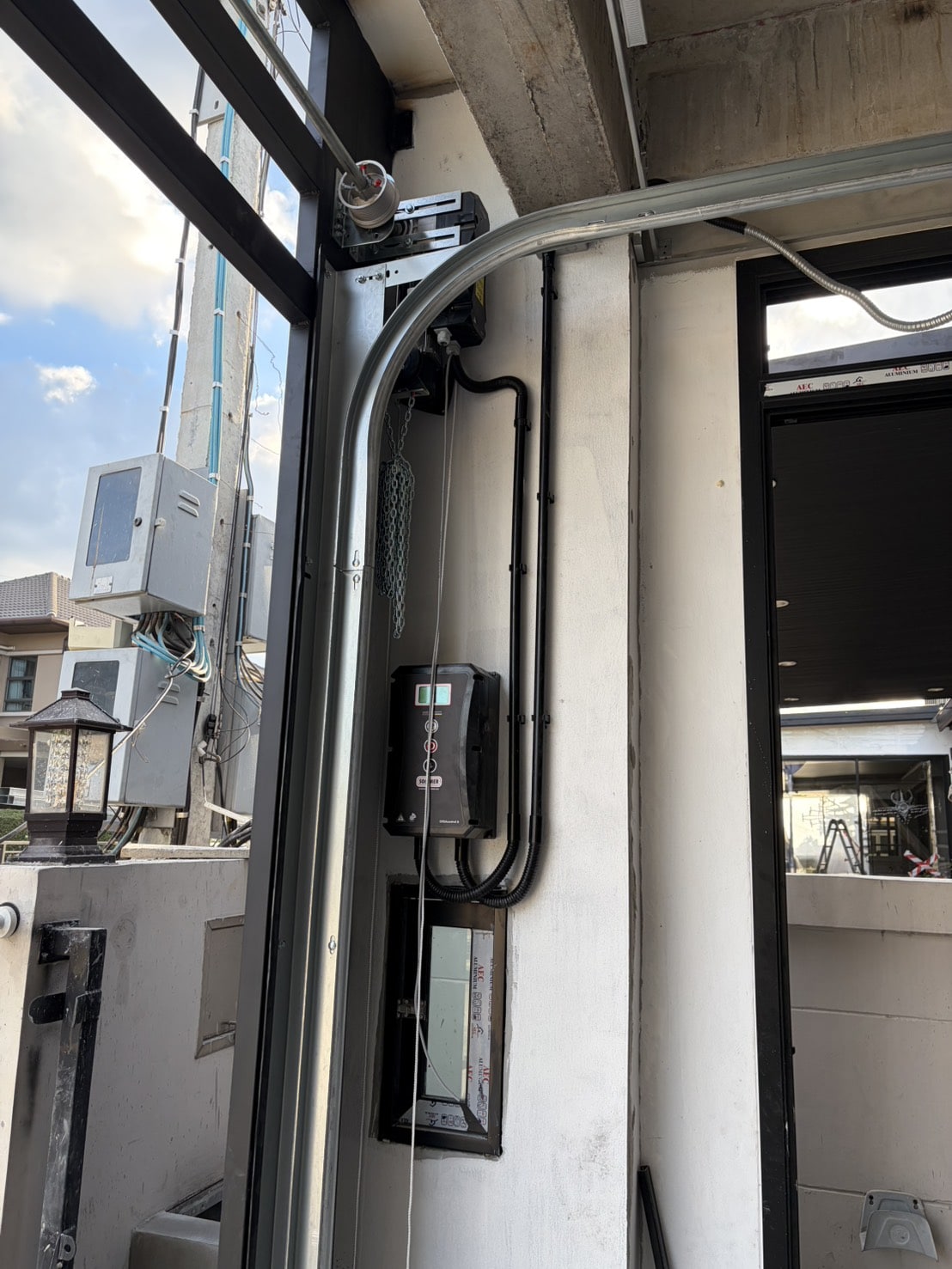 Installation photo of Garage Doors for Single House in Nonthaburi by OZ DOOR (2)