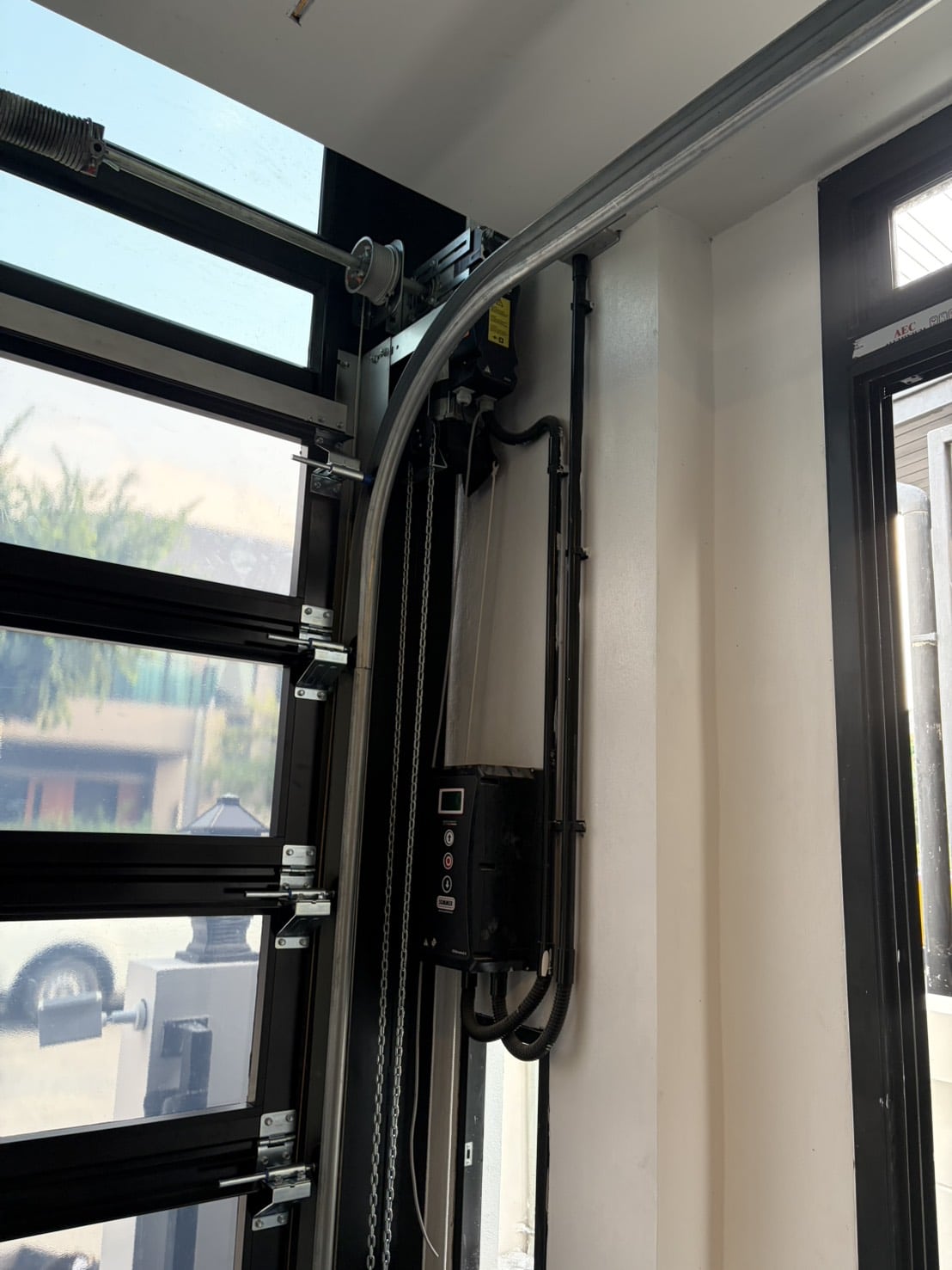 Installation photo of Garage Doors for Single House in Nonthaburi by OZ DOOR (6)