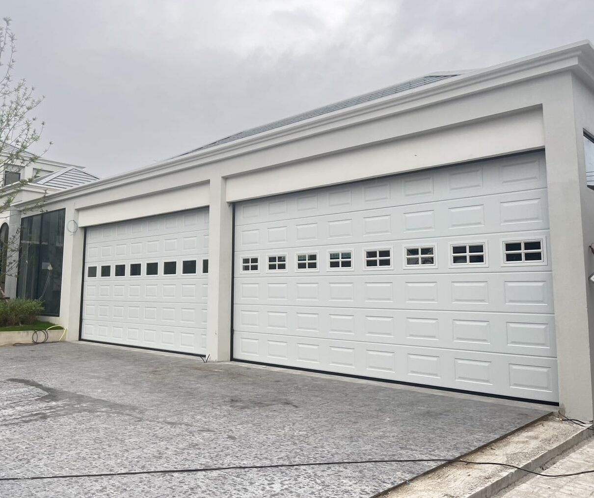Installation photo of Garage Doors for Single House in Pathum Thani by OZ DOOR