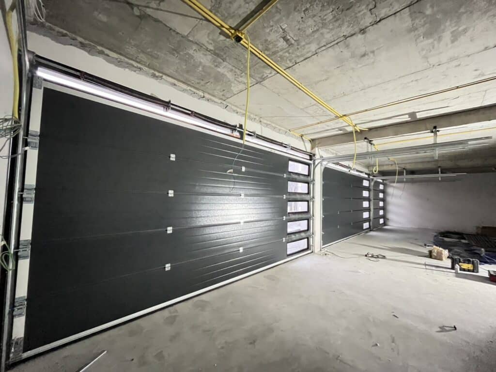 Installation photo of Garage Doors for Single House in Samut Prakan by OZ DOOR (2)