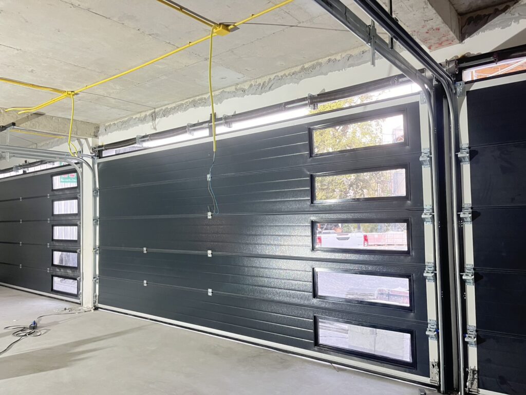 Installation photo of Garage Doors for Single House in Samut Prakan by OZ DOOR (3)