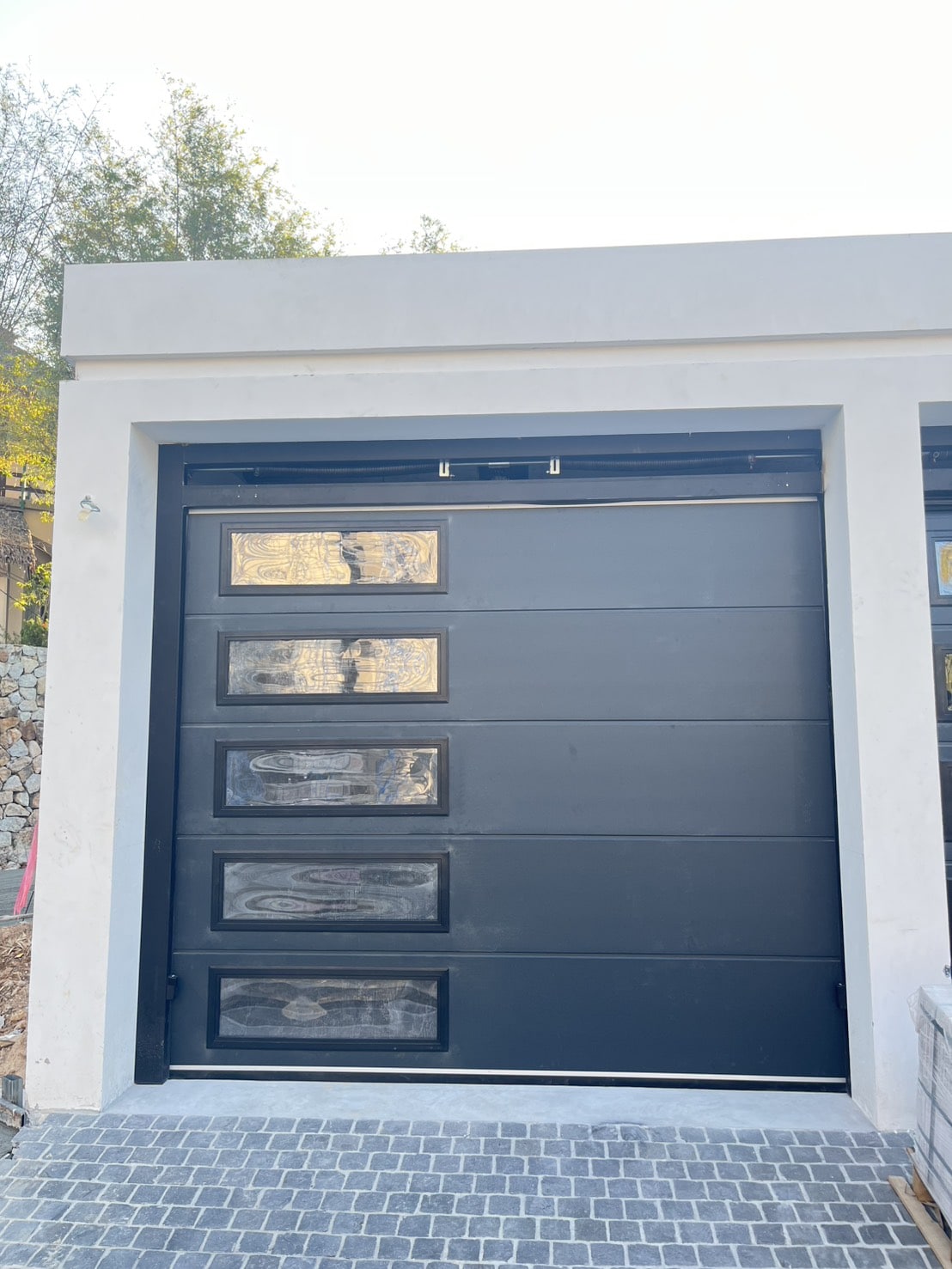 Installation photo of Garage Doors for Single House in Samut Prakan by OZ DOOR (4)