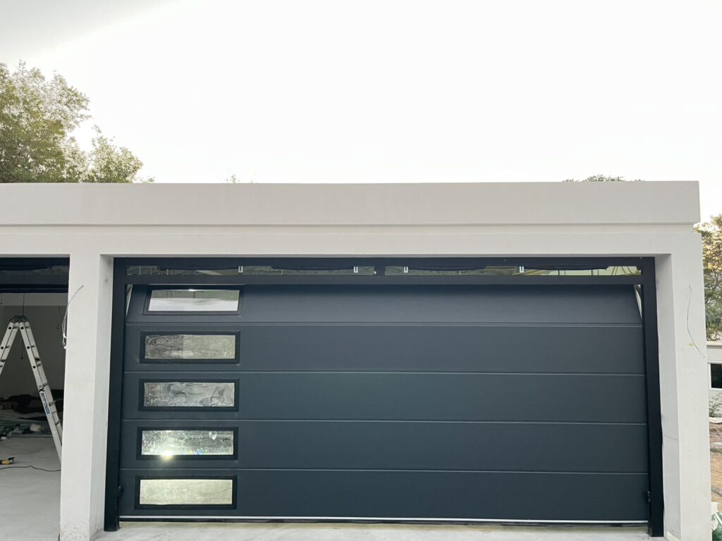 Installation photo of Garage Doors for Single House in Samut Prakan by OZ DOOR (5)
