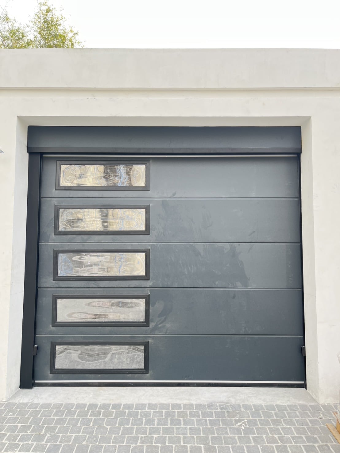 Installation photo of Garage Doors for Single House in Samut Prakan by OZ DOOR (6)