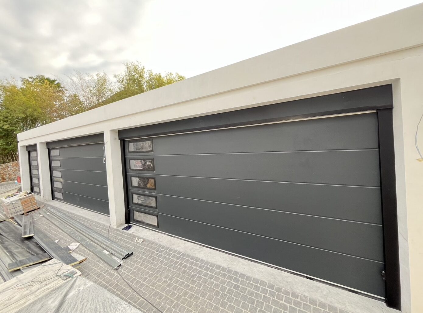 Installation photo of Garage Doors for Single House in Samut Prakan by OZ DOOR