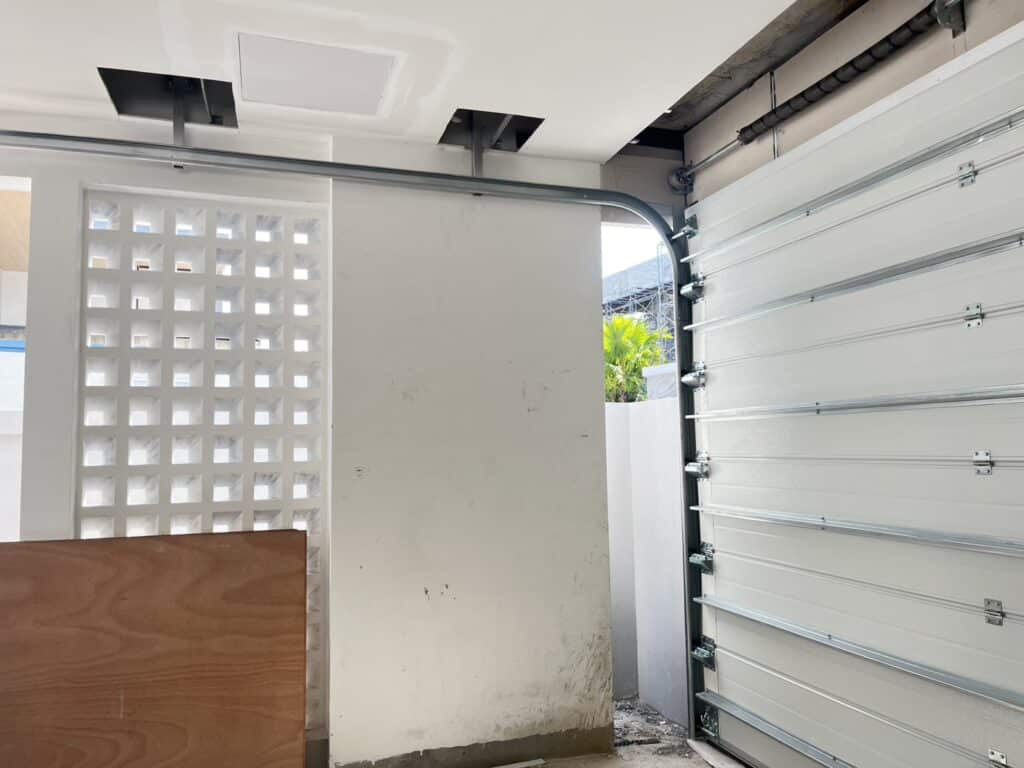 Installation photo of Garage Doors for Housing Estate / Developer in Nonthaburi by OZ DOOR (2)