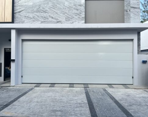 Project installation photo of Standard Garage Doors with White for Housing Estate / Developer in Nonthaburi by OZ DOOR