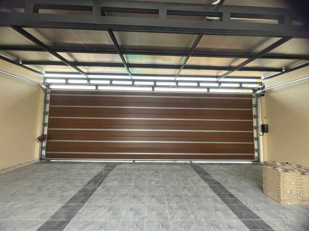 Installation photo of Garage Doors for Single House in Chonburi by OZ DOOR (2)