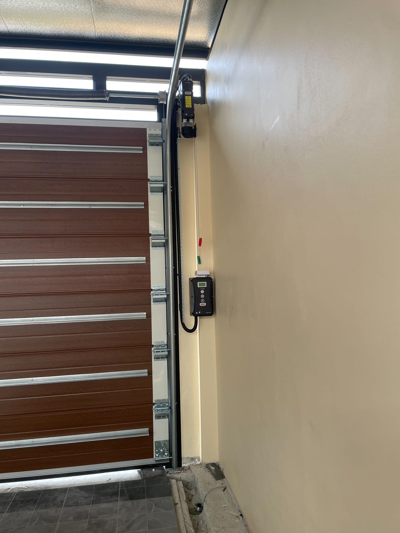 Installation photo of Garage Doors for Single House in Chonburi by OZ DOOR (3)