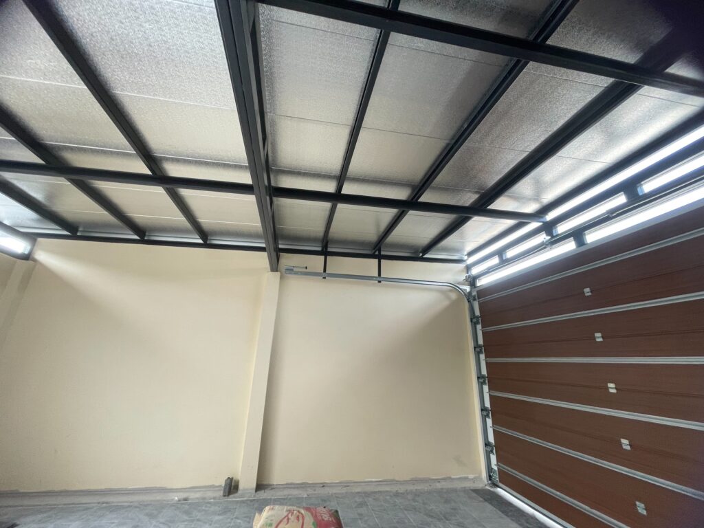 Installation photo of Garage Doors for Single House in Chonburi by OZ DOOR (4)