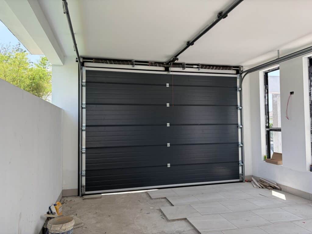 Installation photo of Garage Doors for Single House in Pathum Thani by OZ DOOR (2)