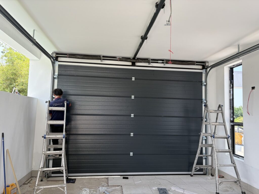 Installation photo of Garage Doors for Single House in Pathum Thani by OZ DOOR (3)