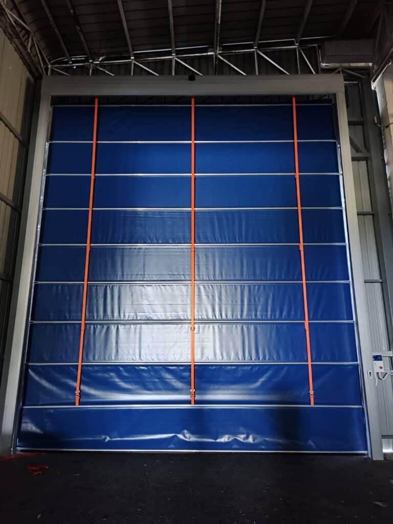 Installation photo of High Speed Doors for พื้นที่อุตสาหกรรมเฉพาะ พื้นที่ควบคุมมลพิษ in Bangkok by OZ DOOR (2)
