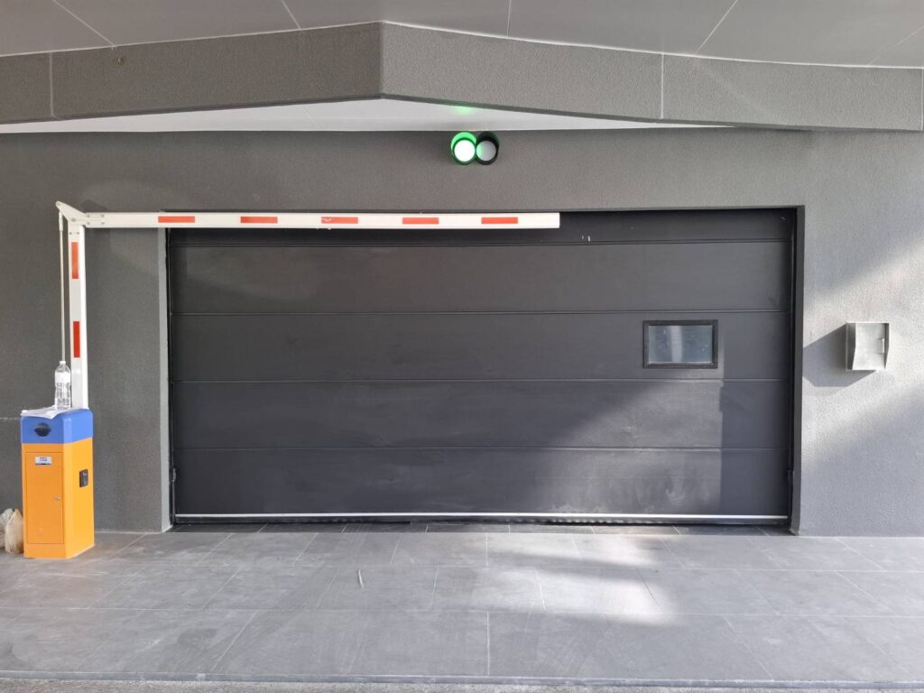 Installation photo of Standard Garage Door for Housing Estate / Developer in Chonburi by OZ DOOR