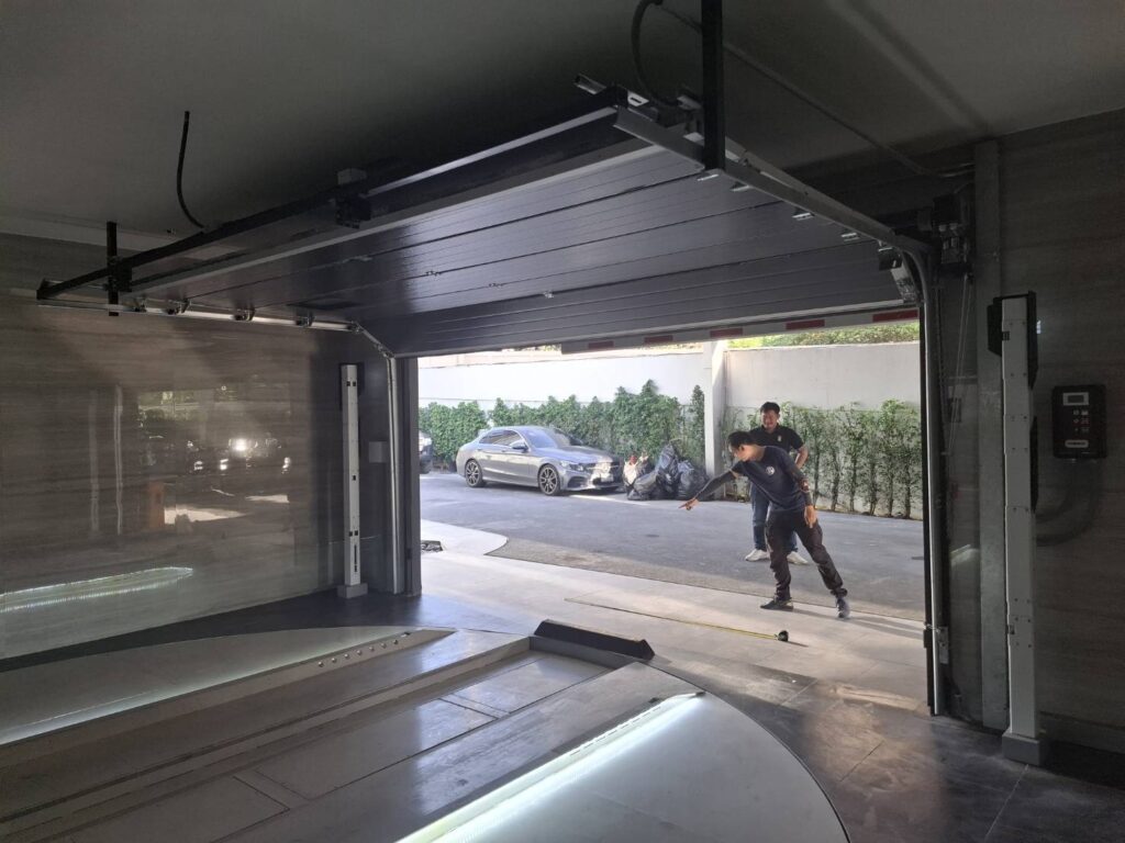 Installation photo of Standard Garage Door for Housing Estate / Developer in Chonburi by OZ DOOR (4)
