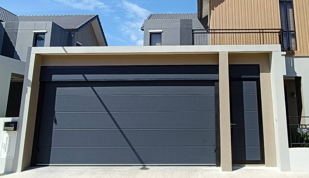 Installation photo of Standard Garage Door for Single House in Chonburi by OZ DOOR