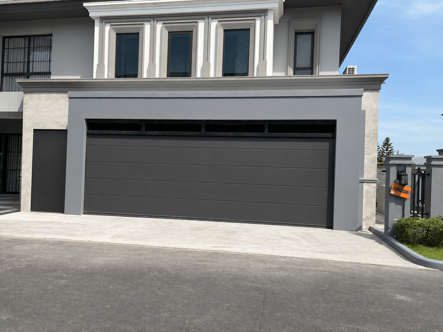 Installation photo of Standard Garage Door for Single House in Nonthaburi by OZ DOOR