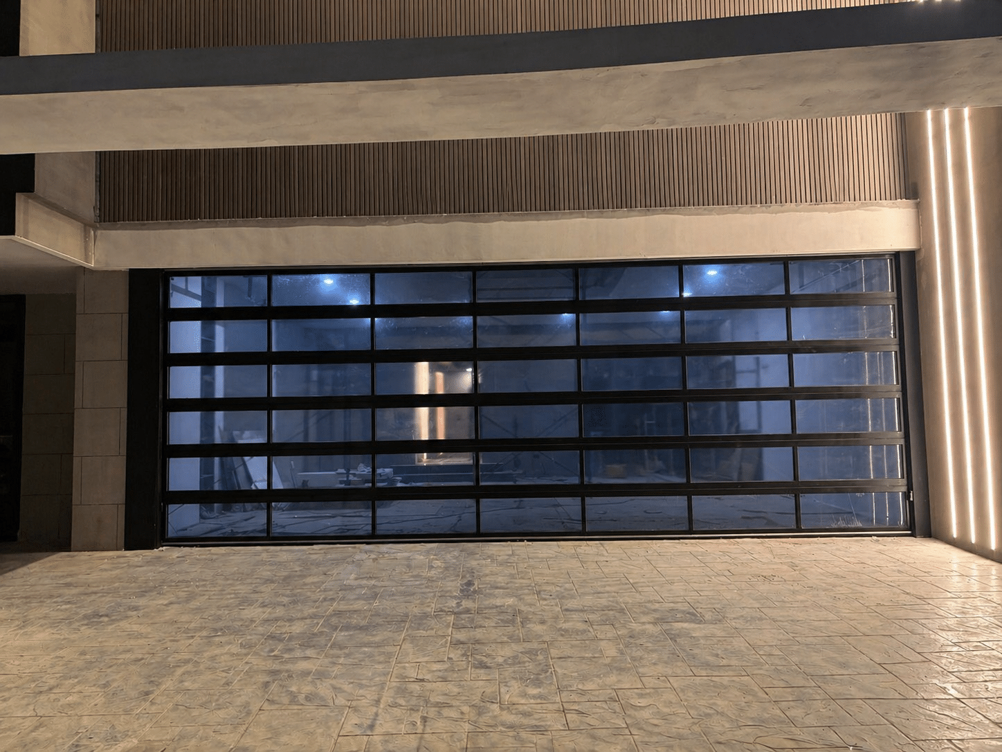 Installation photo of Full View Garage Door for Single House in Bangkok by OZ DOOR