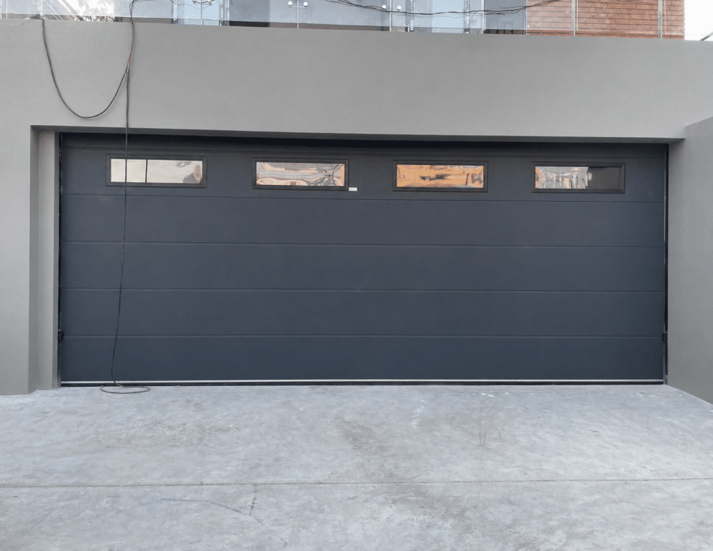 Installation photo of Standard Garage Door for Single House in Bangkok by OZ DOOR