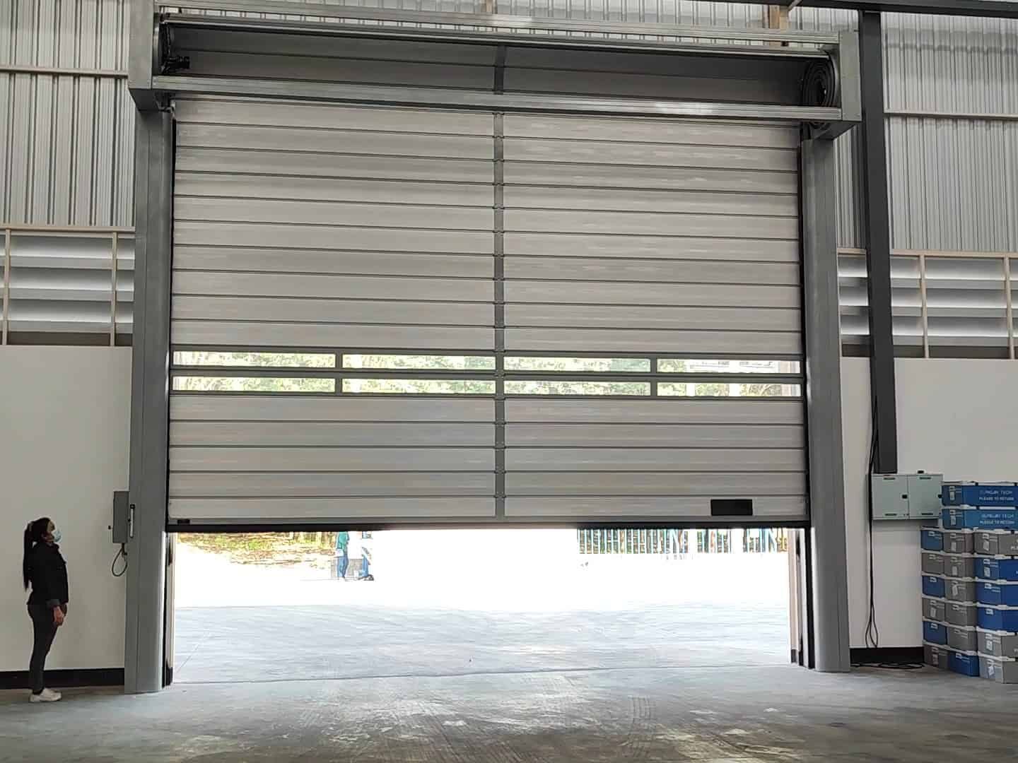 Spiral high speed door example for a rigid-panel industrial opening