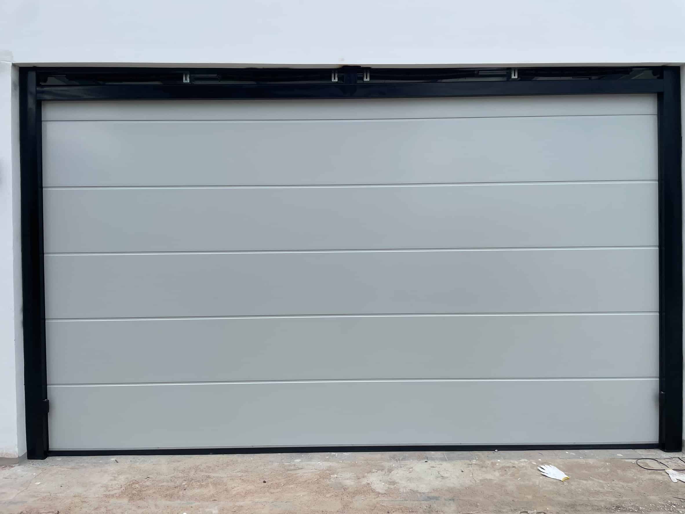 Installation photo of Standard Garage Door for Single House in Chonburi by OZ DOOR