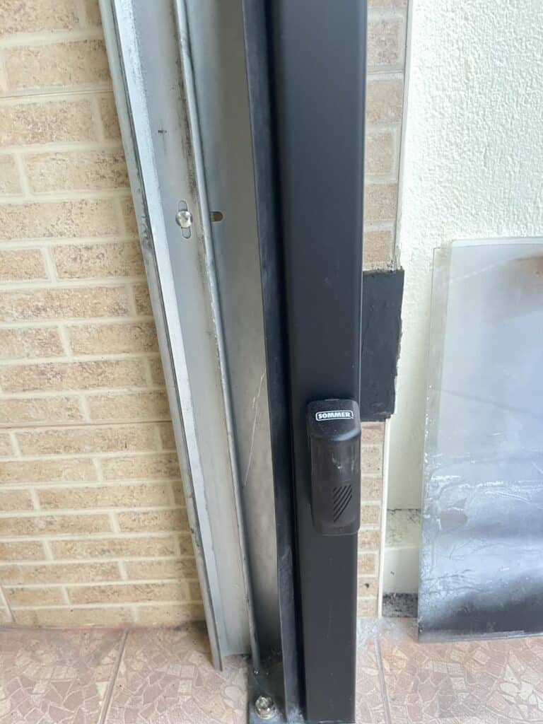 Installation photo of Standard Garage Door for Single House in Phuket by OZ DOOR (9)