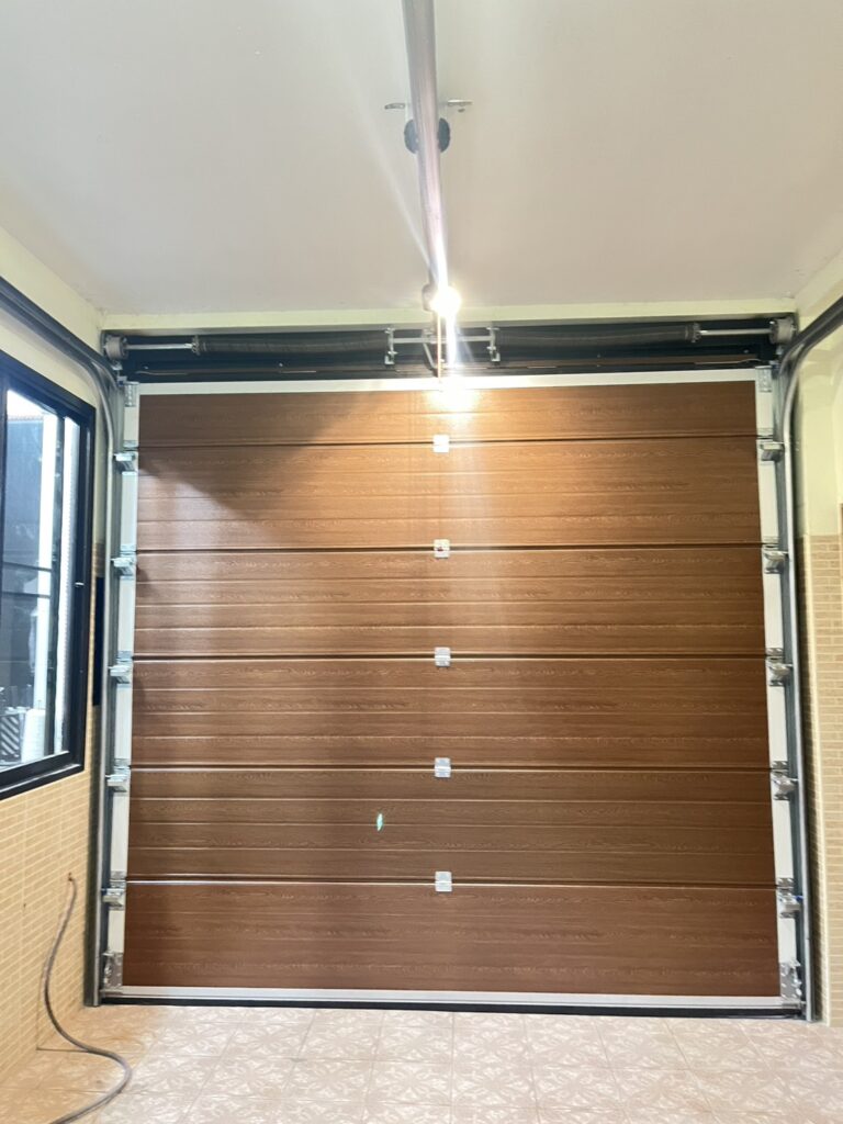 Installation photo of Standard Garage Door for Single House in Phuket by OZ DOOR (3)
