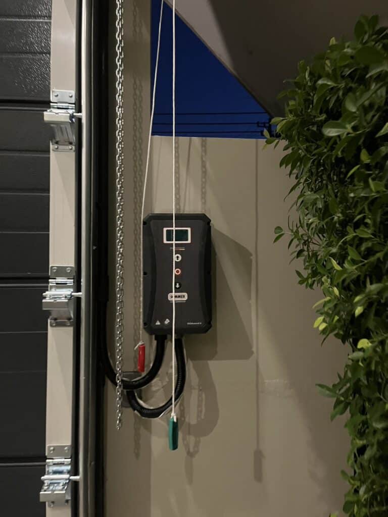 Installation photo of Standard Garage Door for Single House in Surat Thani by OZ DOOR (5)
